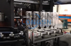 Máquina de fabricación de moldeo por soplado de botellas de PET de plástico de bebidas completamente automáticas de 4 cavidades